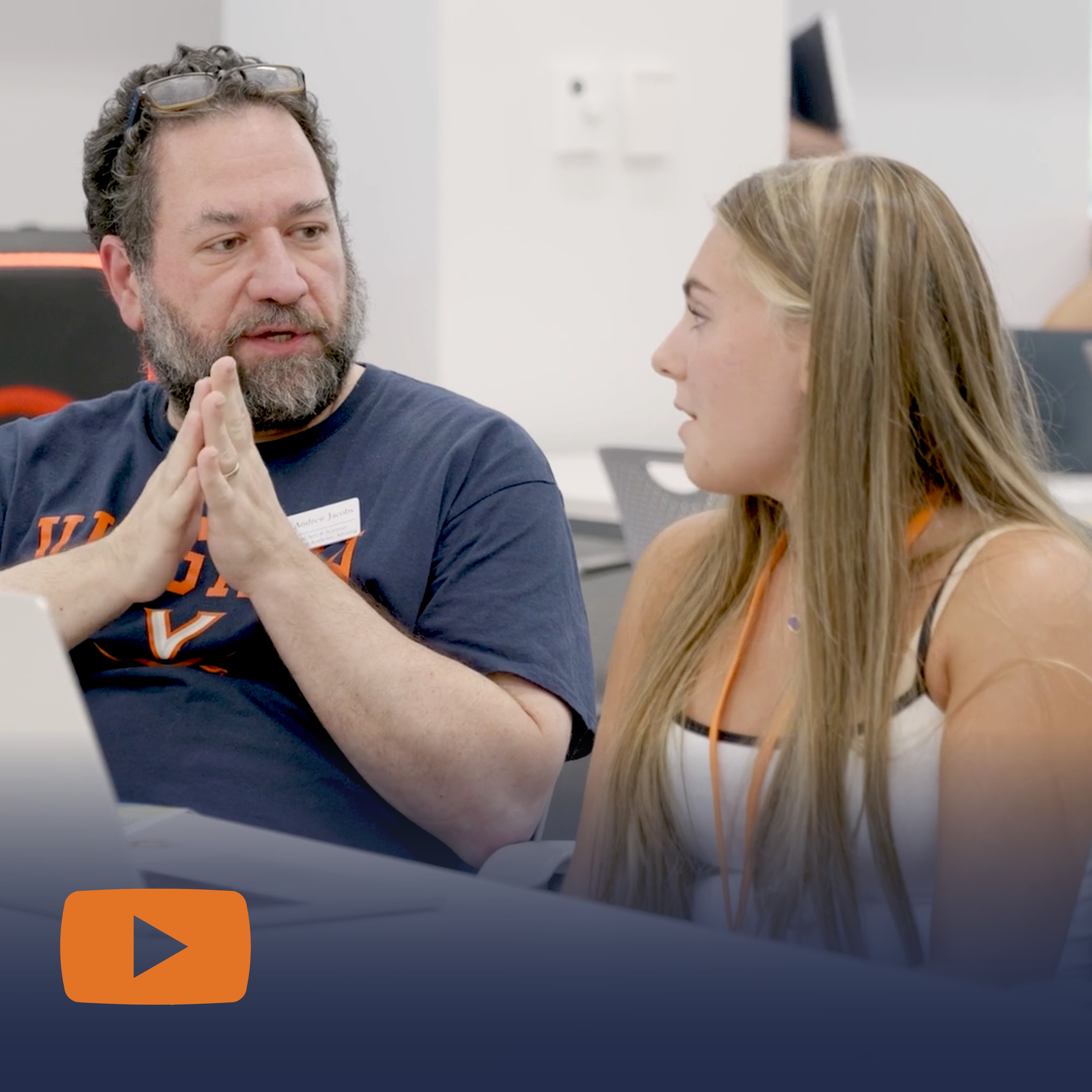 Faculty and student in conversation 